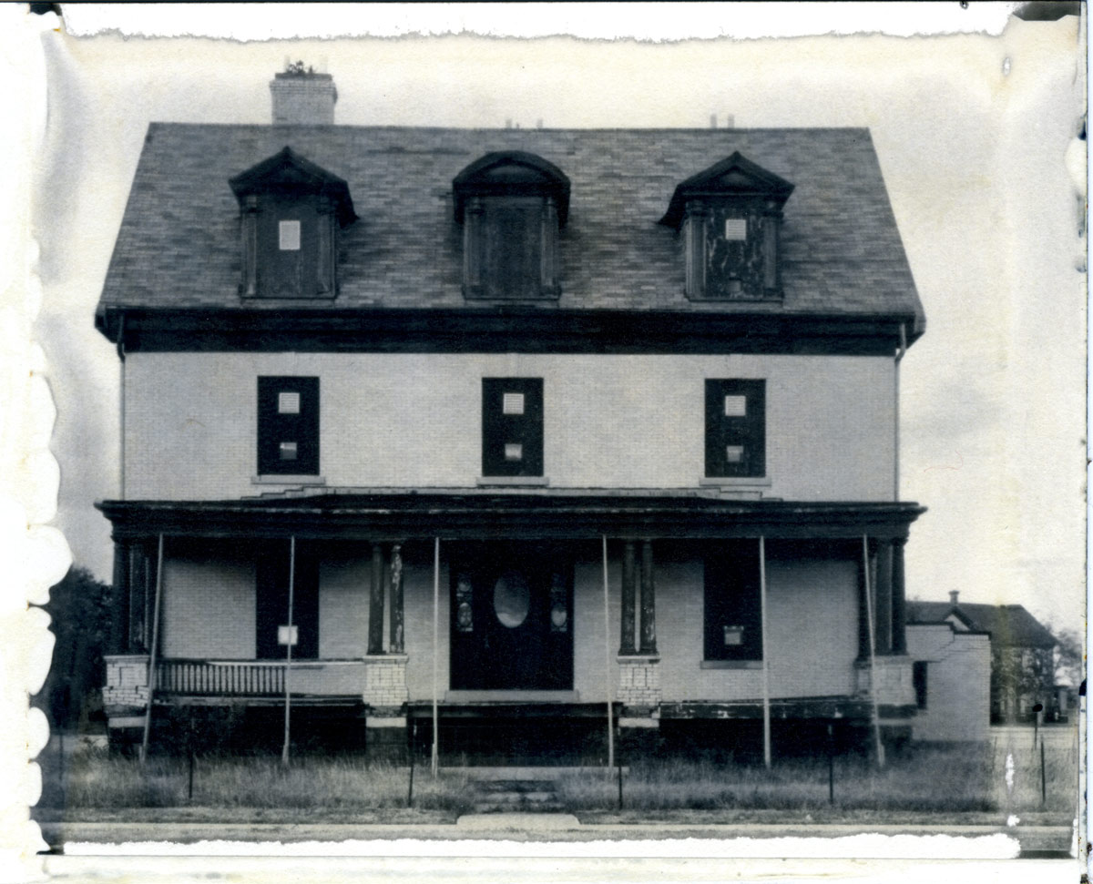 Scan of the print of a New55 photo of a building on Officers Row at Sandy Hook, New Jersey